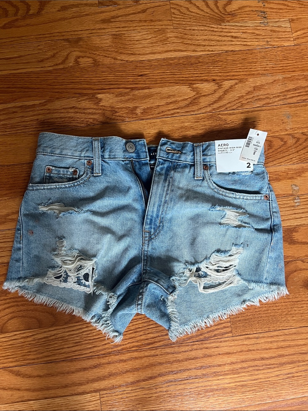 Women’s high-rise, light wash jean shorts